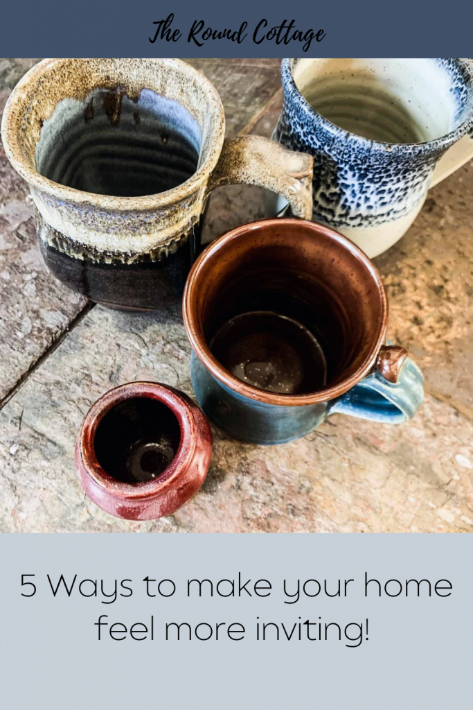 pinterest pin of 4 pottery cups and a red jar saying title. 